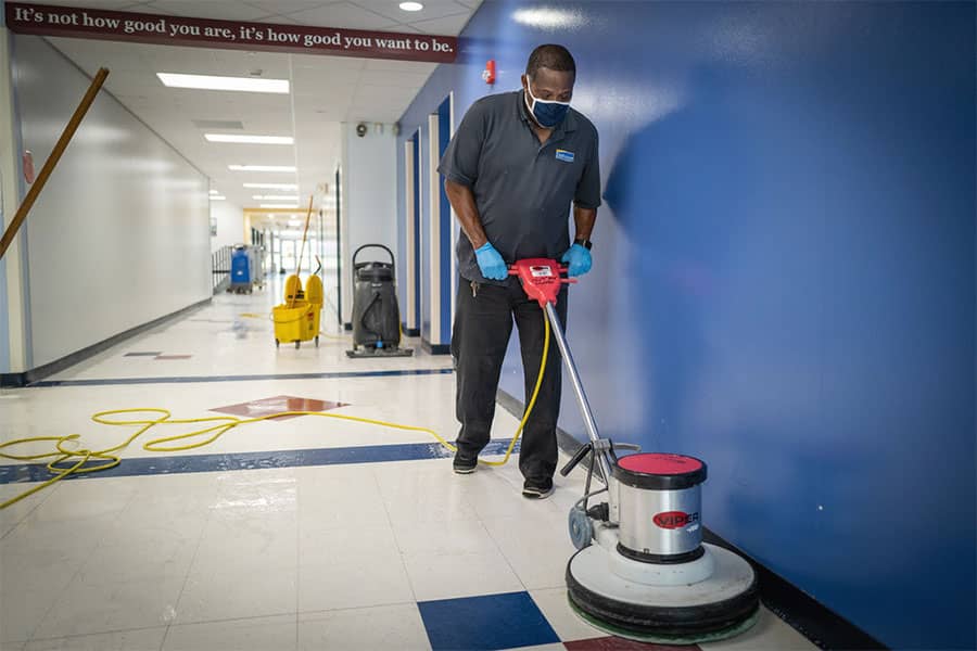 What do professionals use to clean grout?